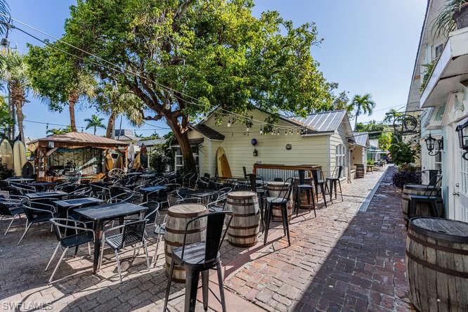 View of patio featuring a bar