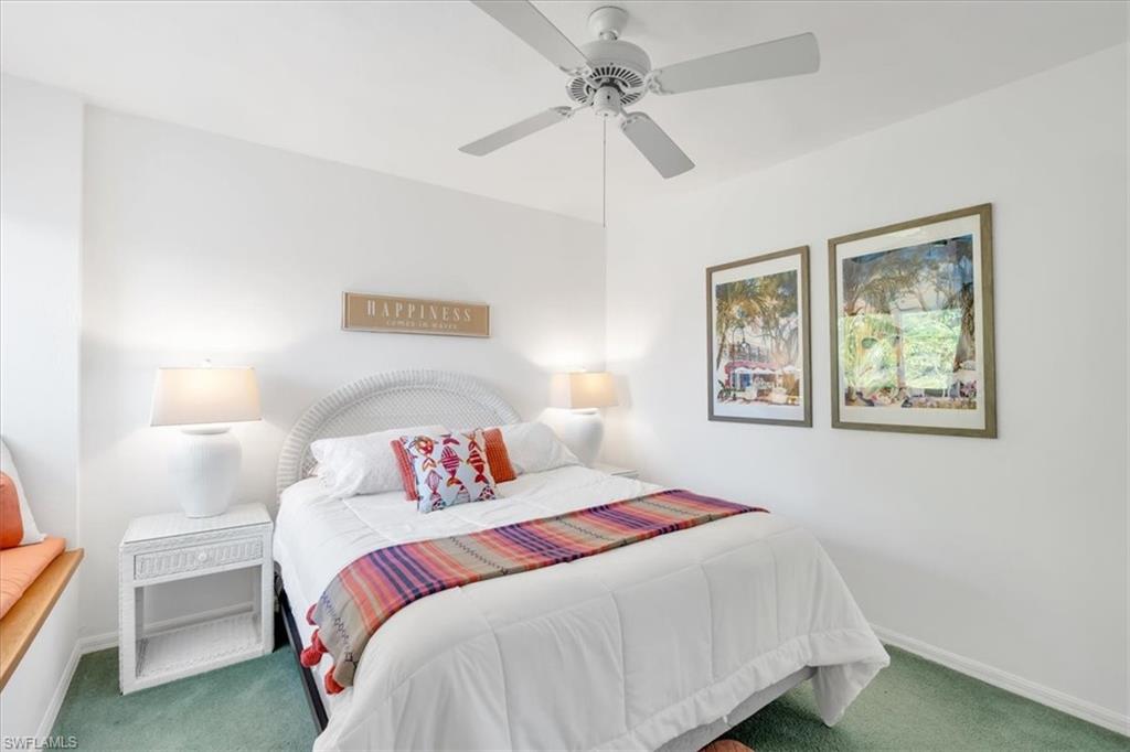 Bedroom featuring carpet and a ceiling fan