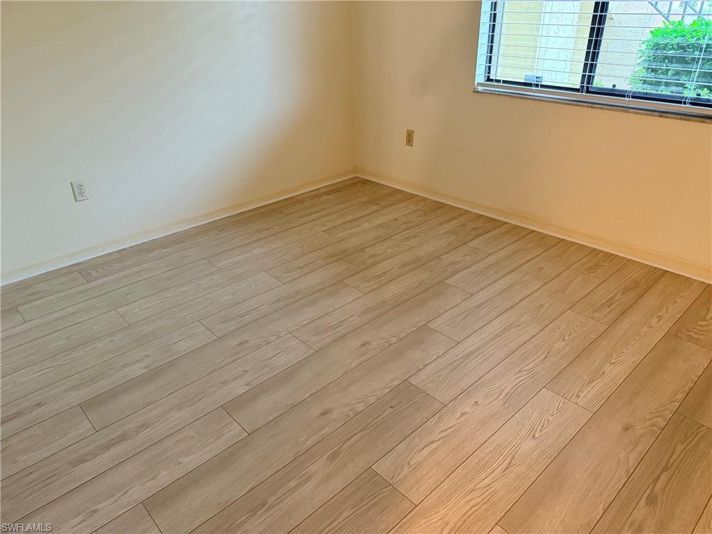 Wood-finish plank flooring throughout