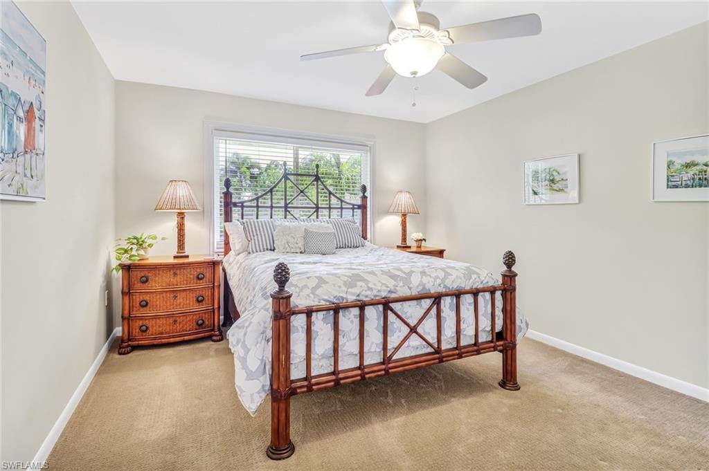 Bedroom featuring carpet flooring and ceiling fan
