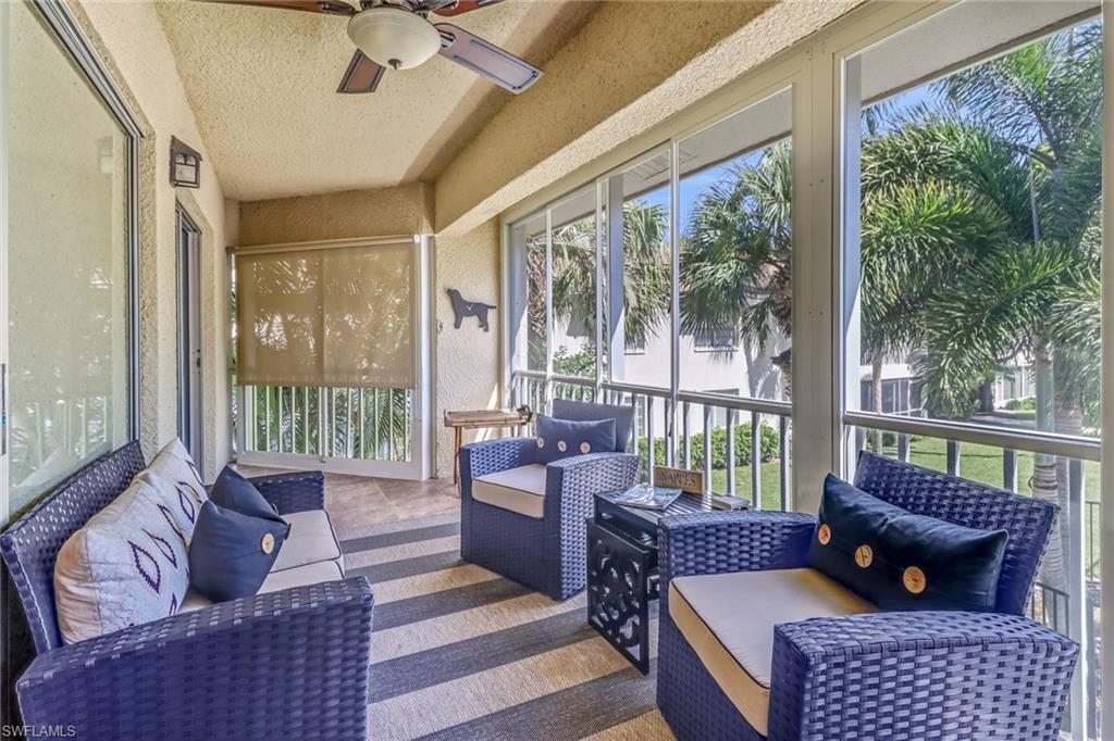 Sunroom with an outdoor hangout area and ceiling fan