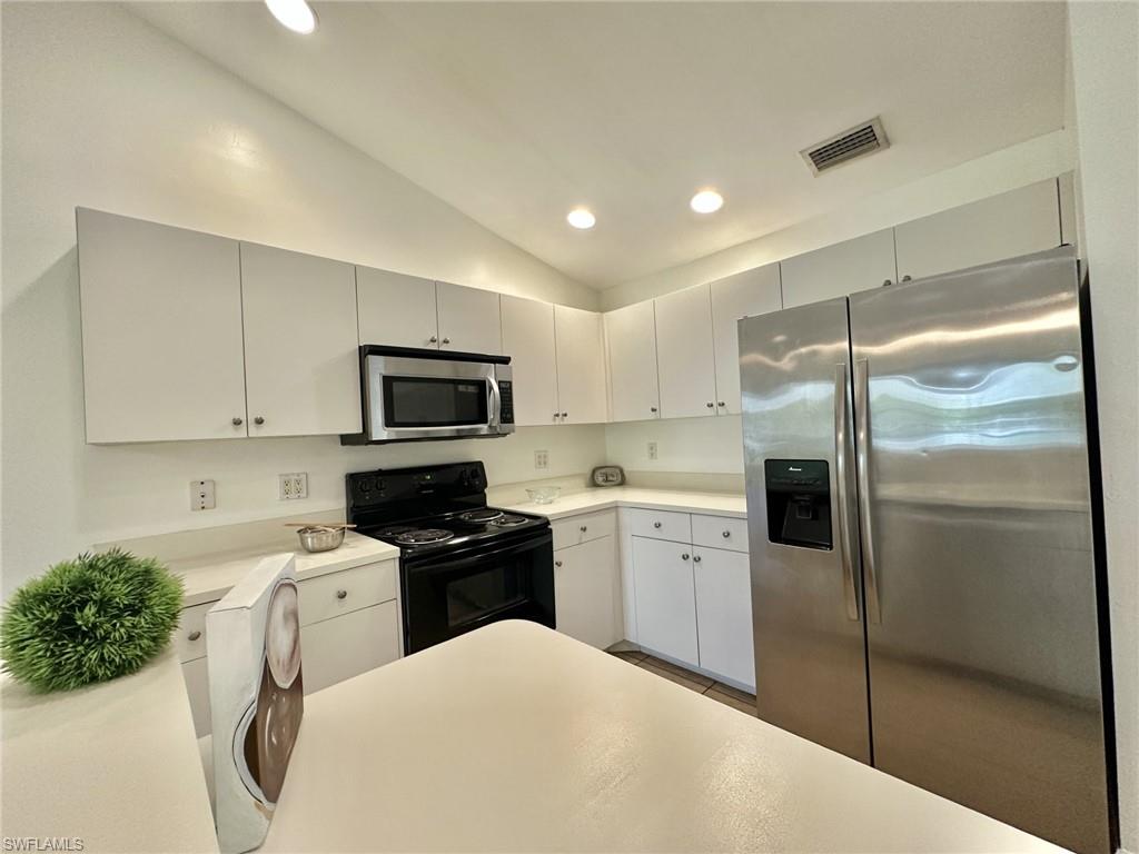 4317 Renovated kitchen with side by side refrigerator and NEW element range