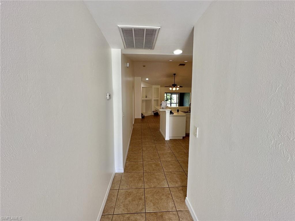 4317 view of entryway from front door and third bedroom / den/office doorway to left