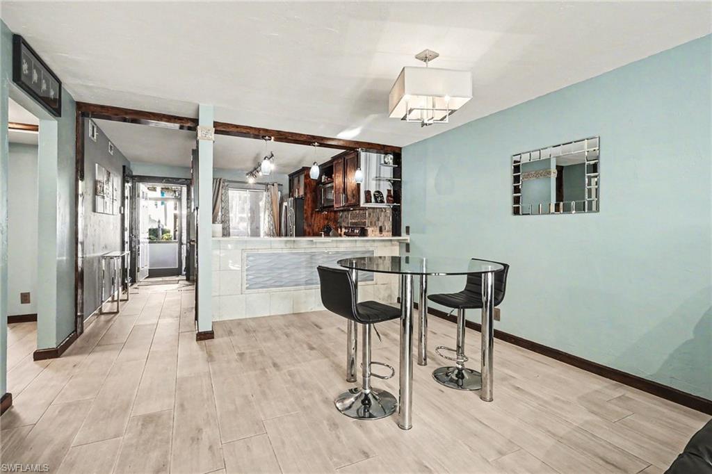 Dining area featuring light wood-style flooring