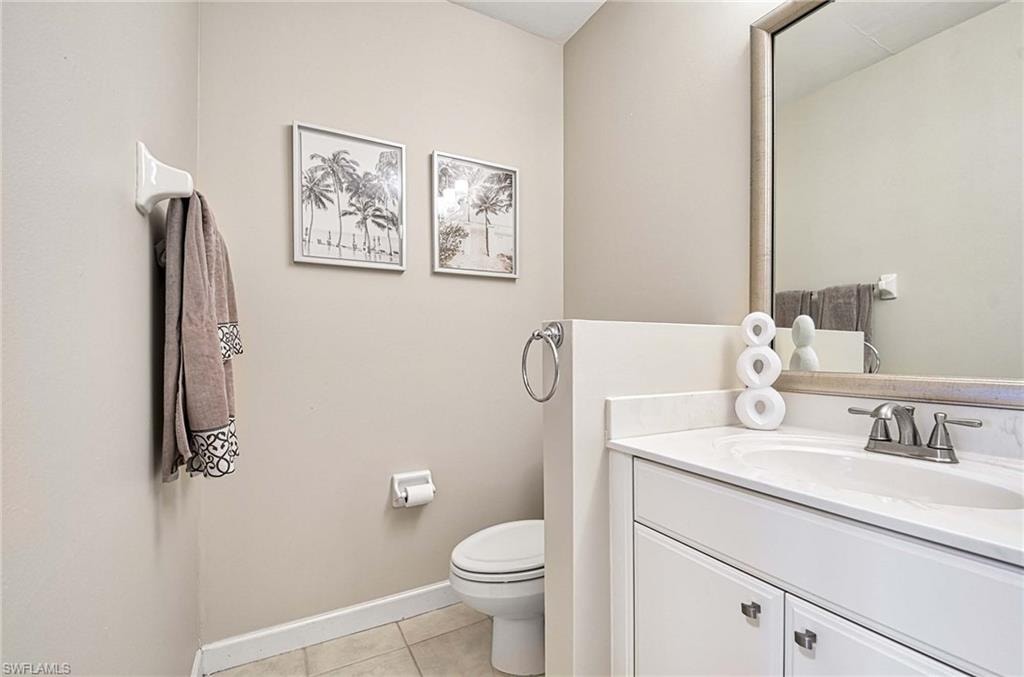 Bathroom with vanity and light tile patterned flooring
