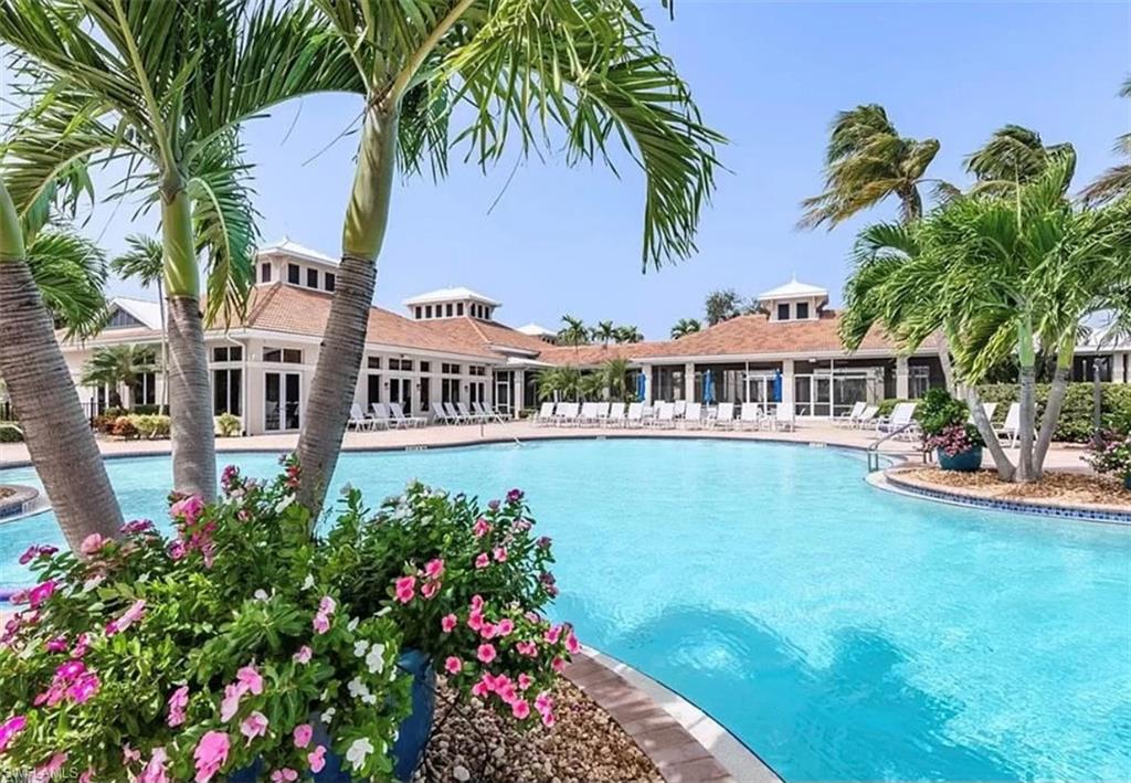 Community pool with a patio area