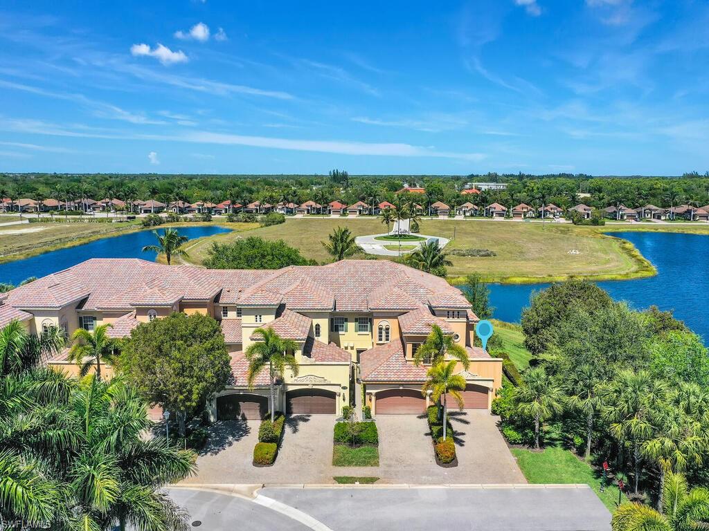 Drone / aerial view featuring a residential view and a water view