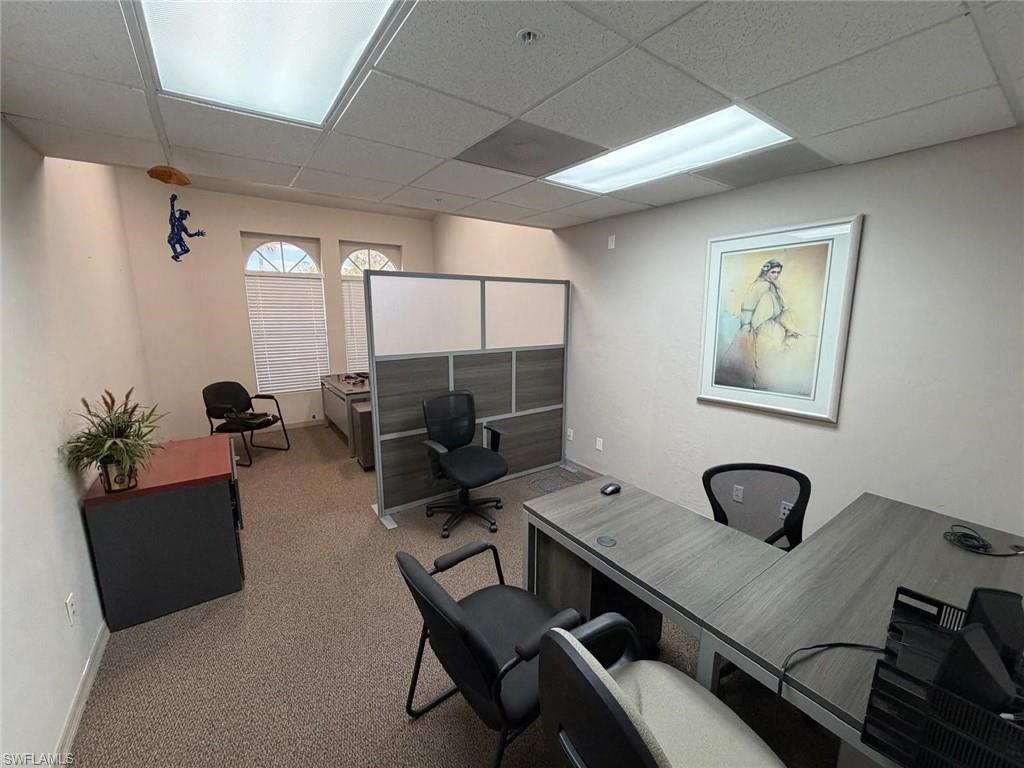 Office space featuring a drop ceiling