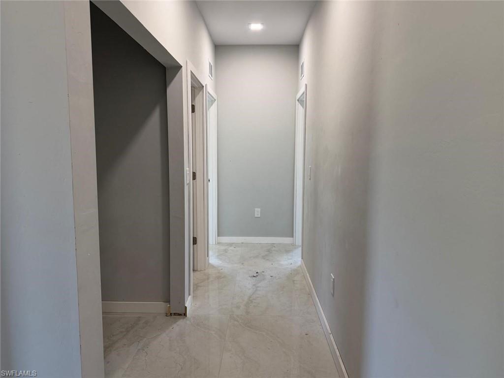 Hallway with baseboards
