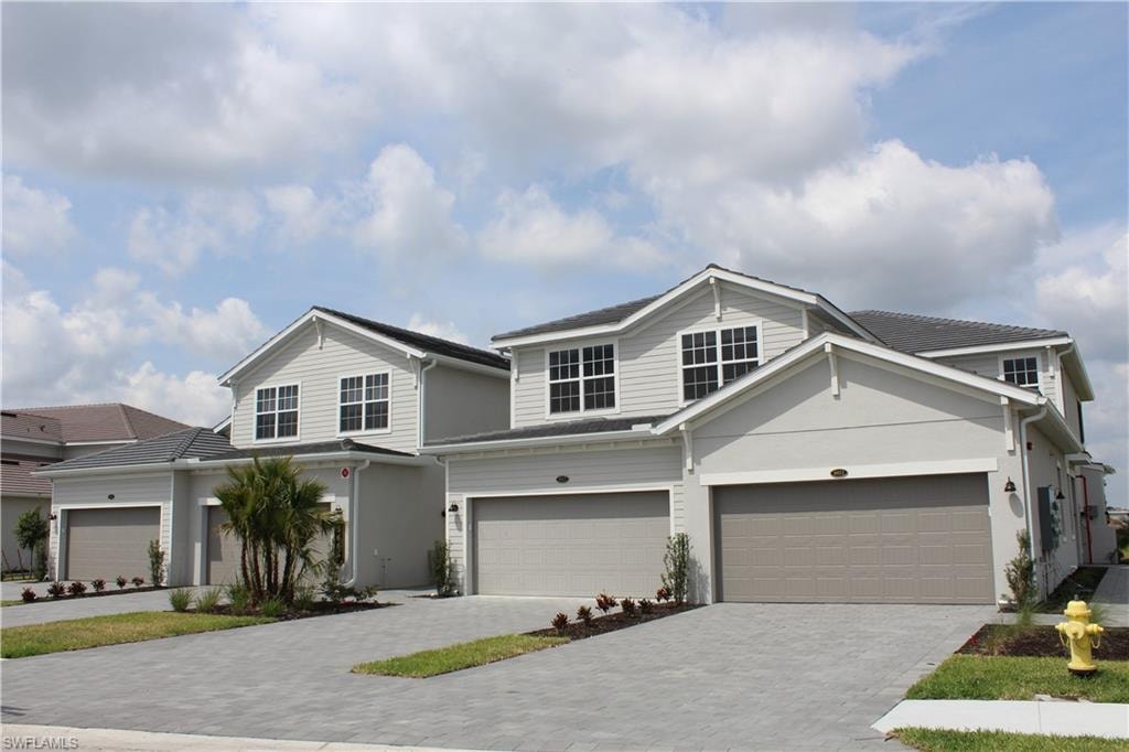 View of front of house featuring driveway and a garage