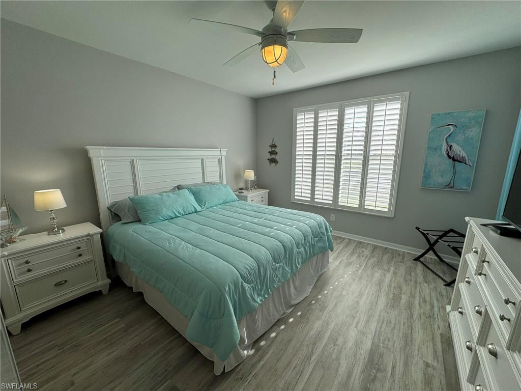 MASTER Bedroom featuring ceiling fan and hardwood / wood-style floors