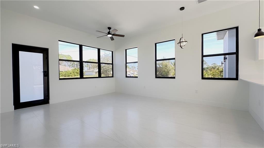 Spare room featuring ceiling fan