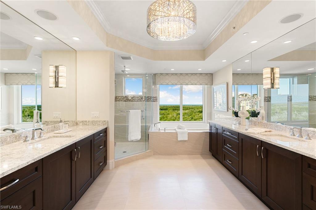 Owners Suite Bath with Split vanities, jetted tub and walk-in shower.