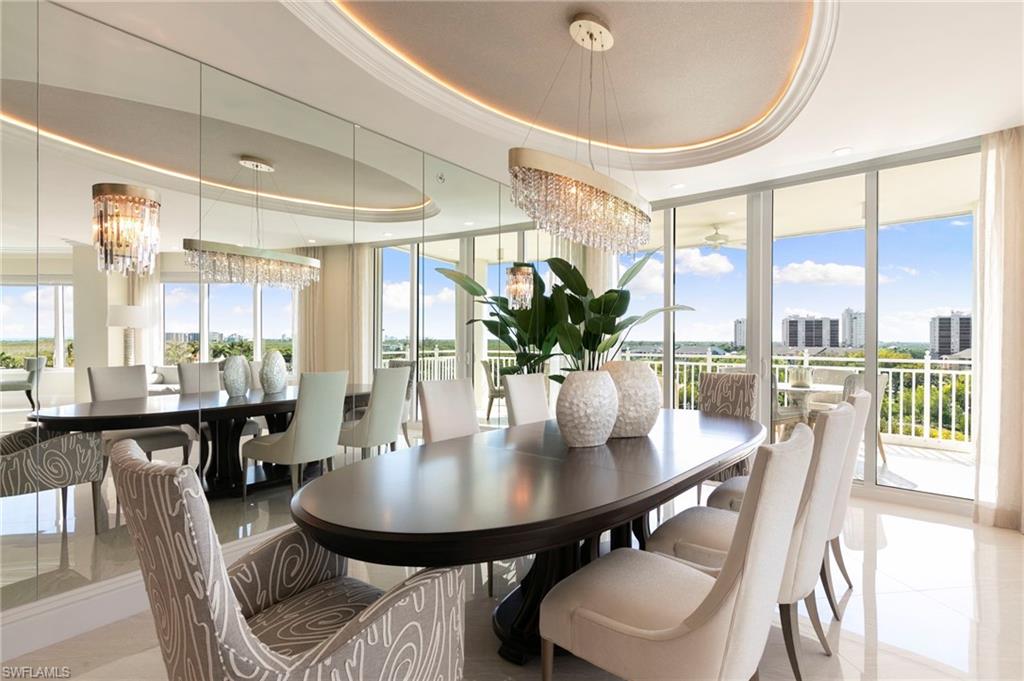 Dining Room for Entertaining with Chandelier and Oval Tray with inset lights
