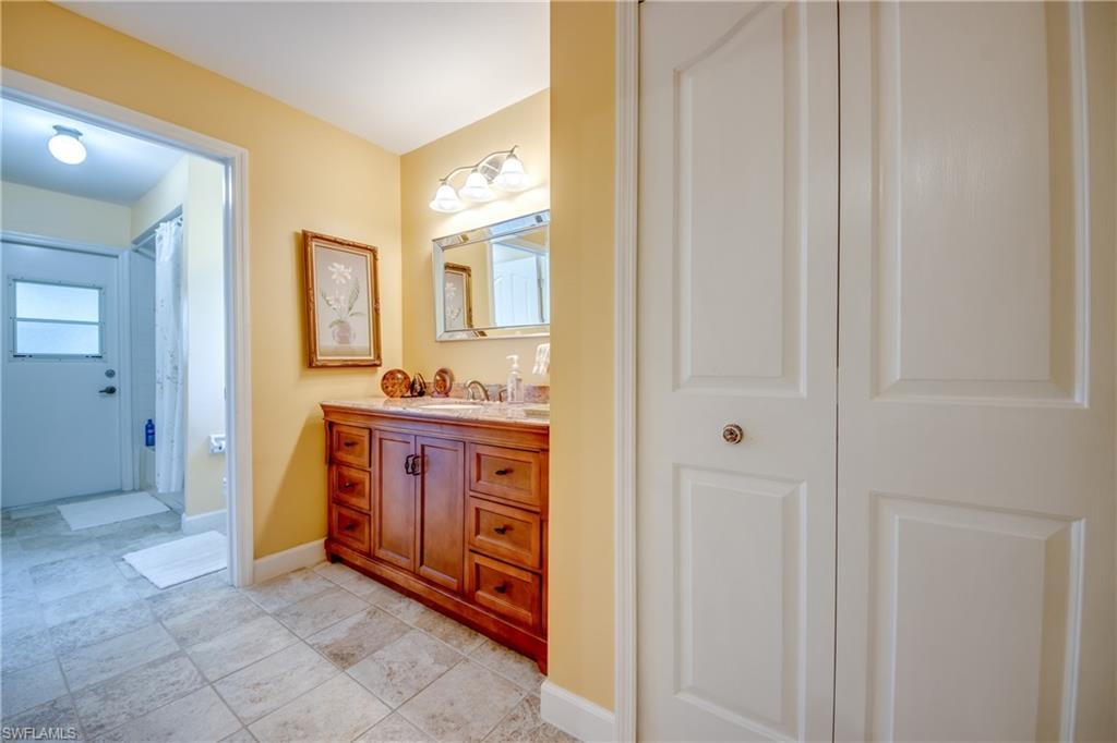 Bathroom featuring vanity