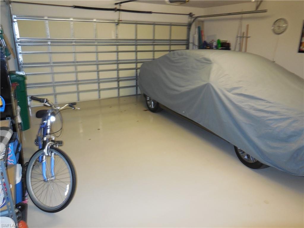 Garage featuring a garage door opener