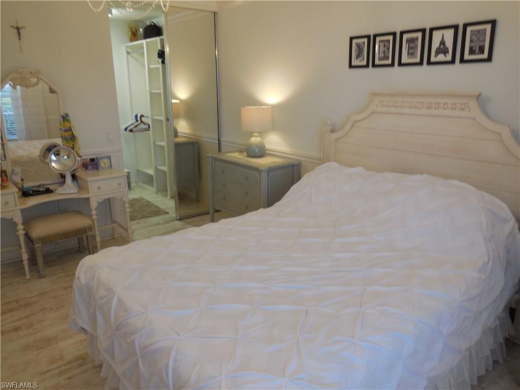 Bedroom featuring a closet and hardwood / wood-style flooring
