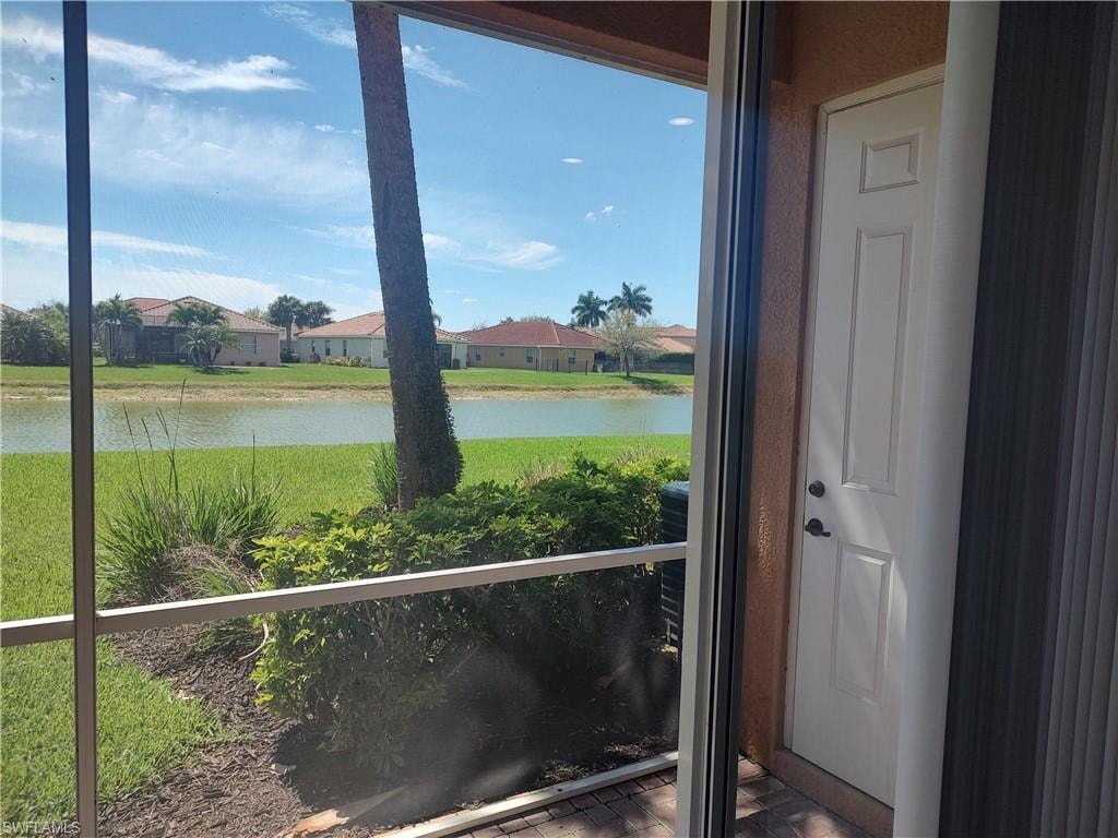 Water view featuring nearby suburban area