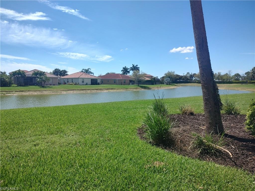 Water view with nearby suburban area