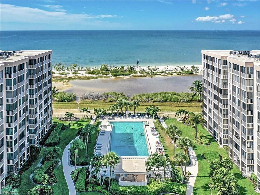 Aerial view of a large body of water and a pool area