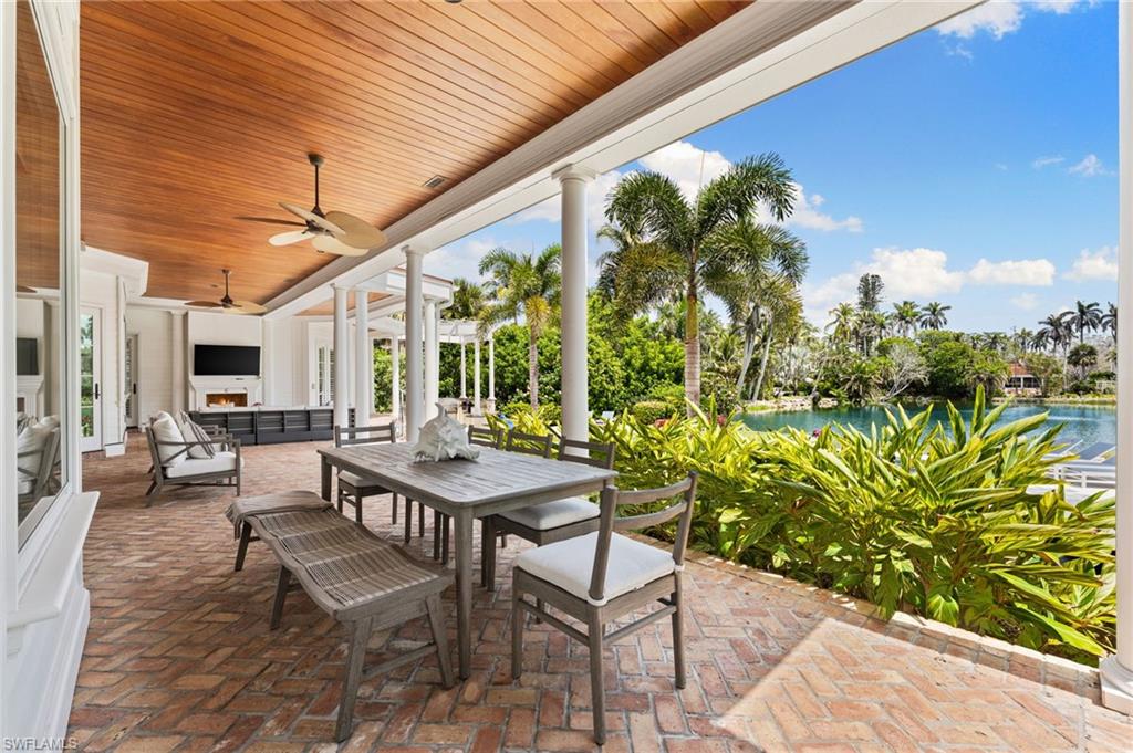 View of patio / terrace featuring outdoor dining space, an outdoor living space, and a ceiling fan