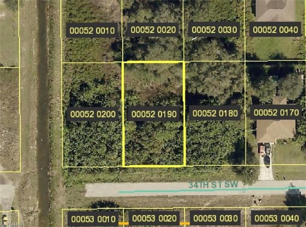 Aerial view of property's location featuring property parcel outlined