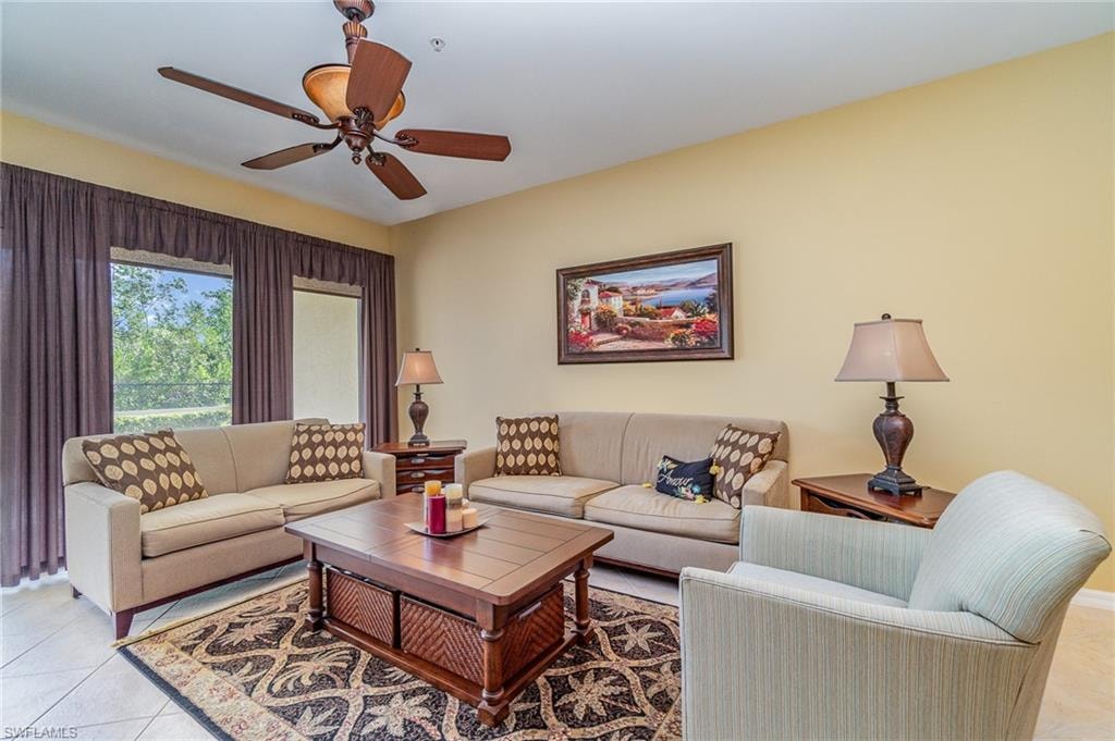 Tiled living room with ceiling fan