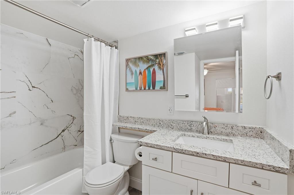 Full bath with vanity and shower / bath combination with curtain - Virtually Edited Image