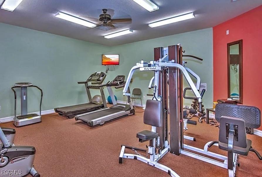 Exercise room featuring ceiling fan
