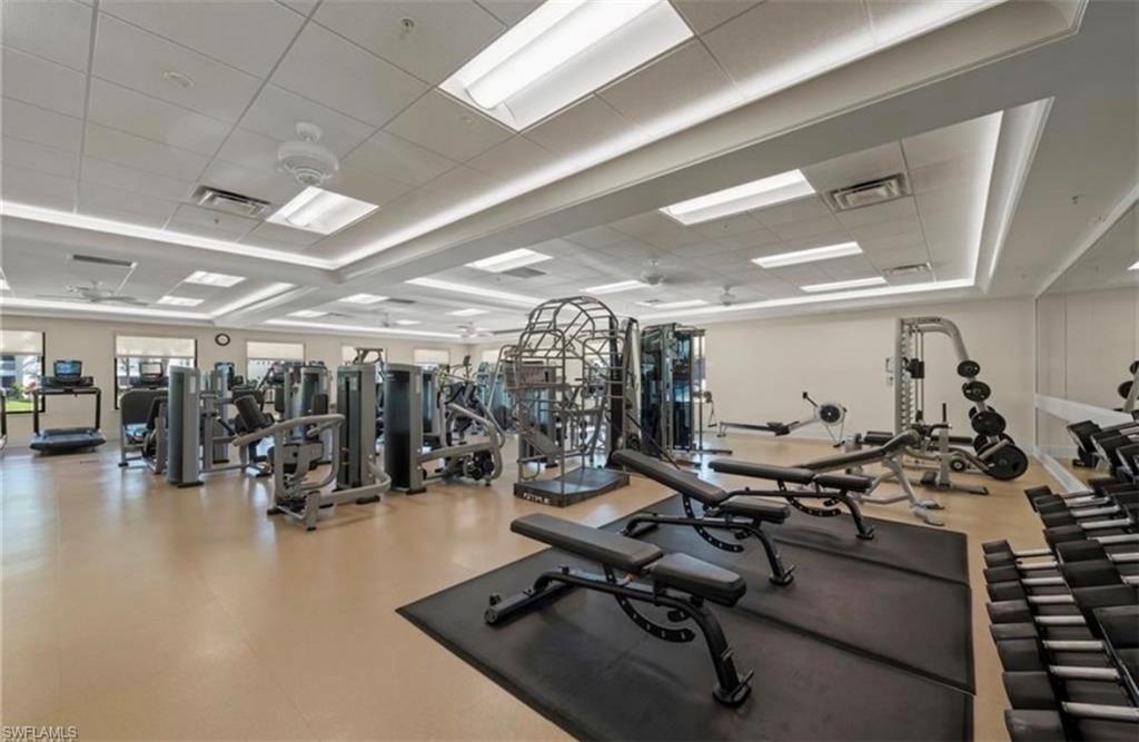Exercise room with a paneled ceiling