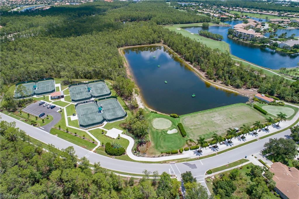 Bird's eye view with a view of trees and a water view