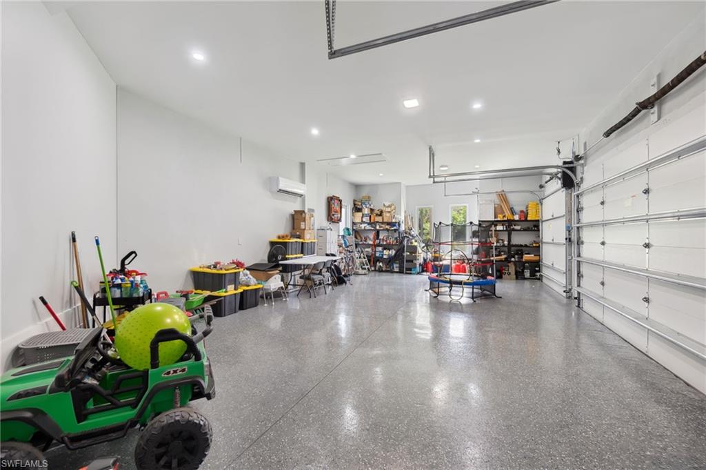Garage with a wall mounted air conditioner