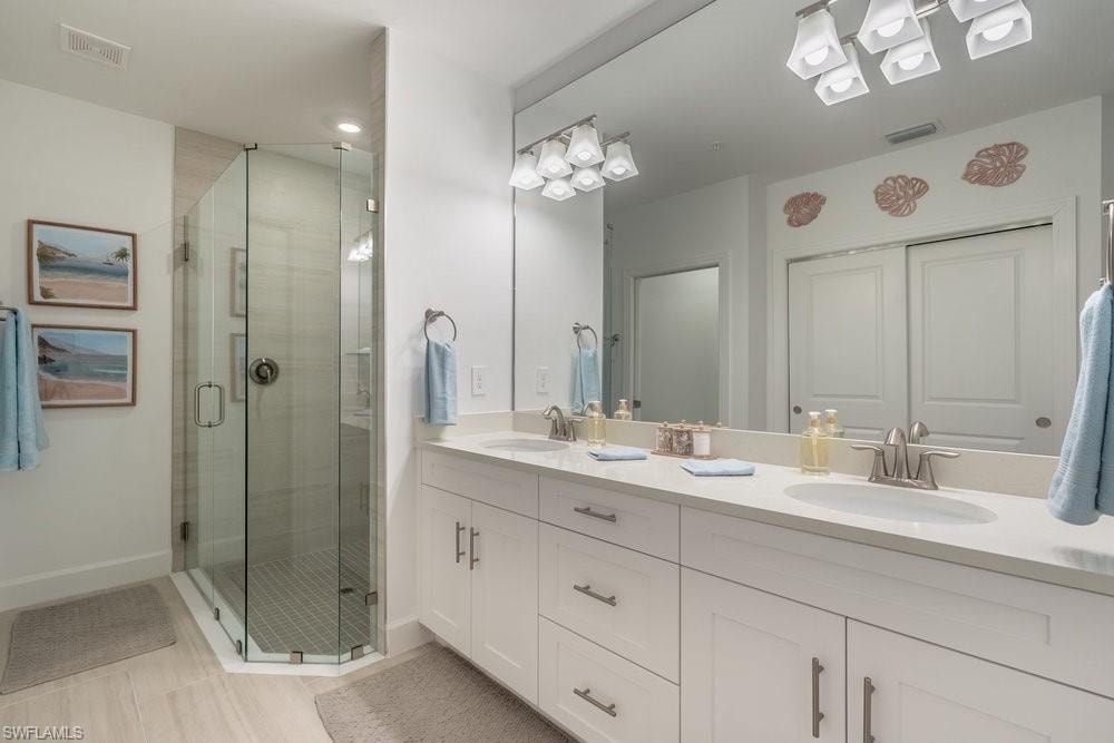 Primary Bath with walk in shower and double vanity