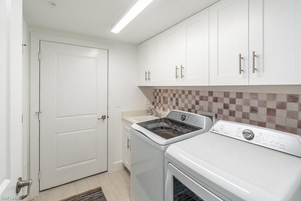 Laundry room washer and dryer and utility tub