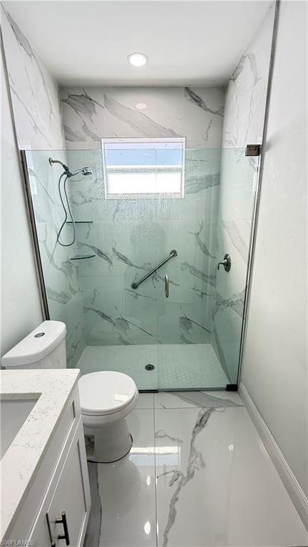 Bathroom with vanity, a marble finish shower, and light marble finish flooring