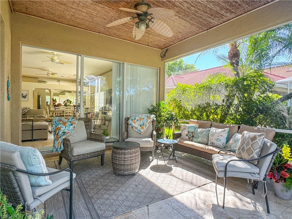 View of terrace featuring an outdoor hangout area and ceiling fan