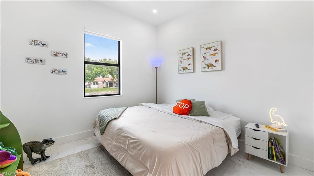Bedroom featuring baseboards