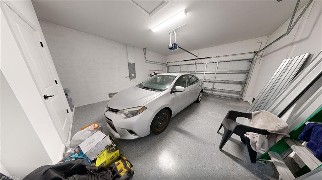Garage with concrete block wall and electric panel