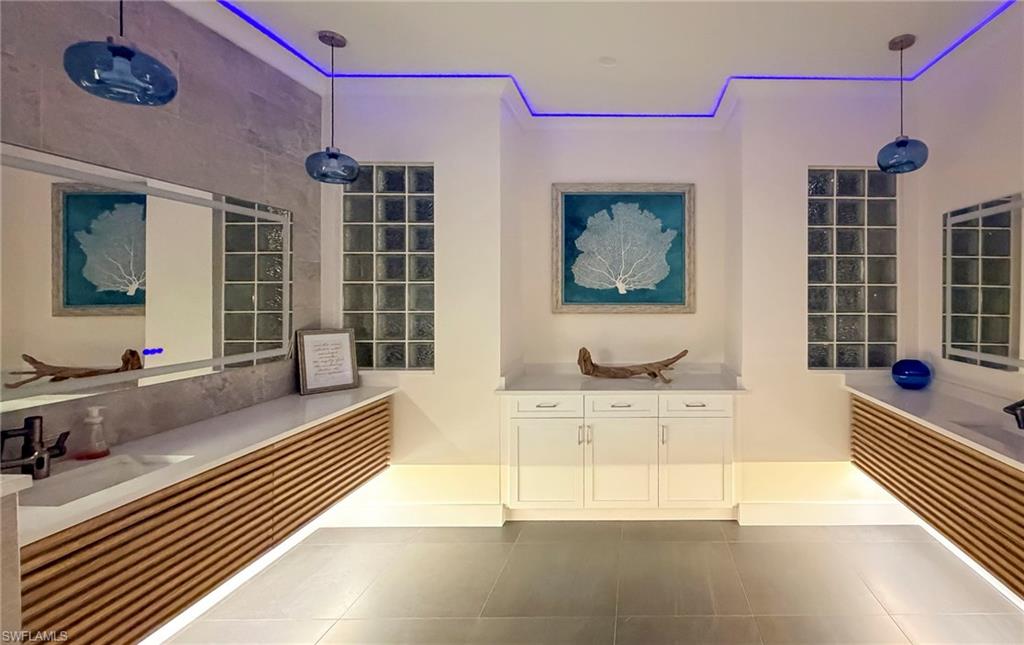 Full bathroom with two vanities