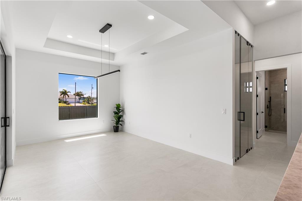 The FORMAL DINING AREA showcases a LARGE PICTURE WINDOW