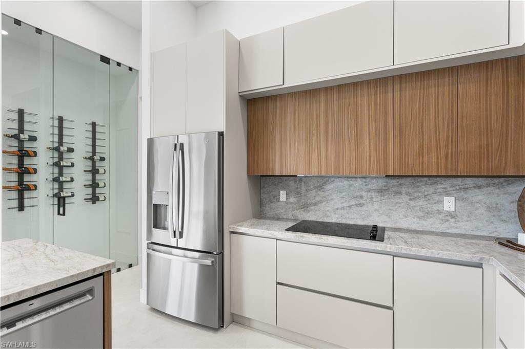 Custom cabinetry, MARBLE TAJ MAHAL COUNTERTOPS w/ FULL BACKSPLASH