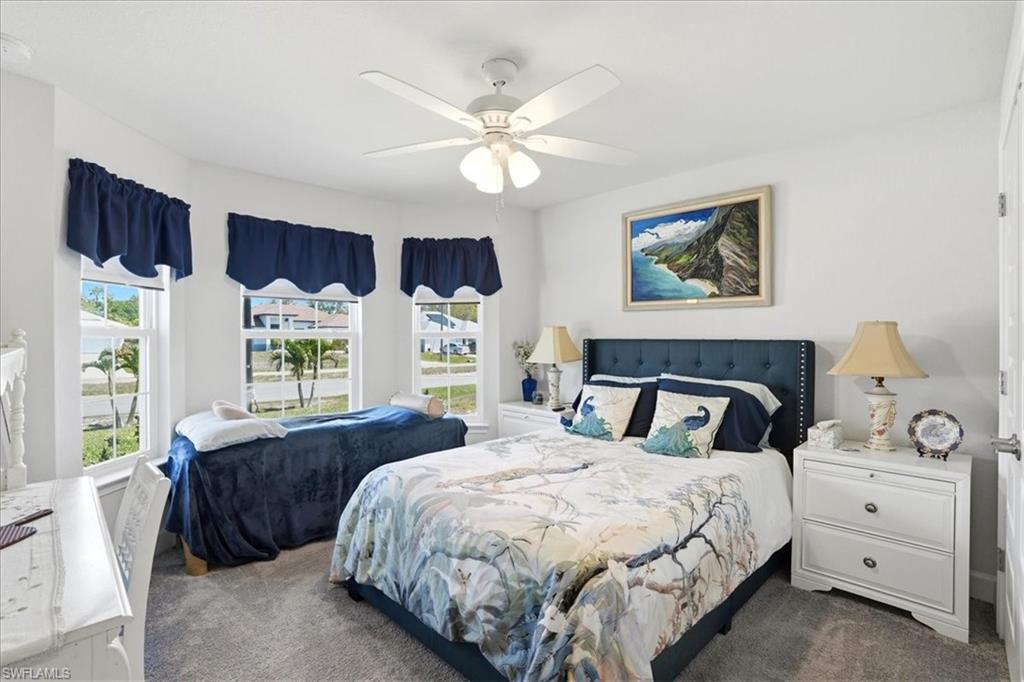 VIRTUALLY STAGED Laundry room with washing machine and dryer and cabinet space