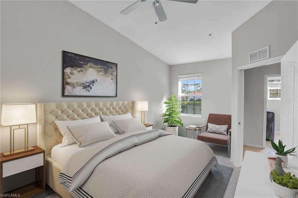Carpeted bedroom with ceiling fan