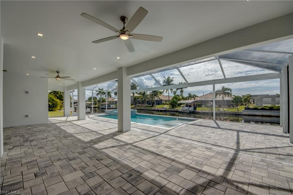 Patio where outdoor kitchen will be built. Example of similar home.