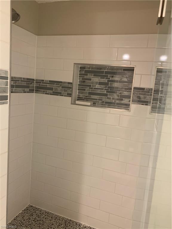 Details featuring tiled shower