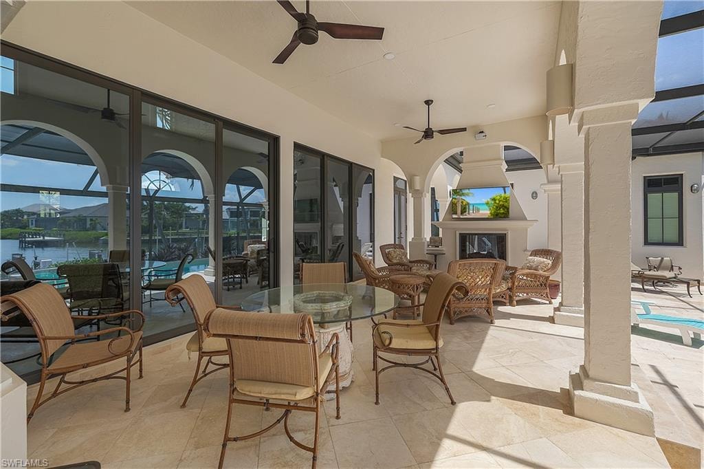 Spacious patio with TV and double side fireplace