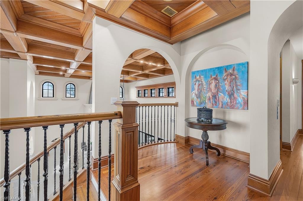 Second floor landing, next to elevator.