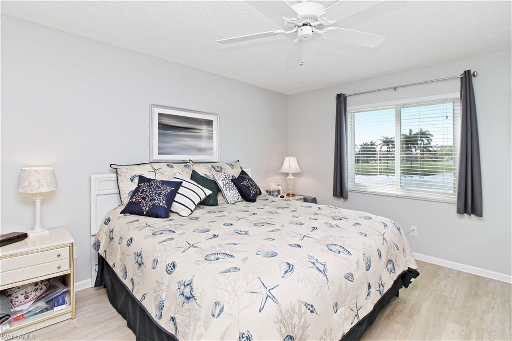 Primary bedroom with lake view.
