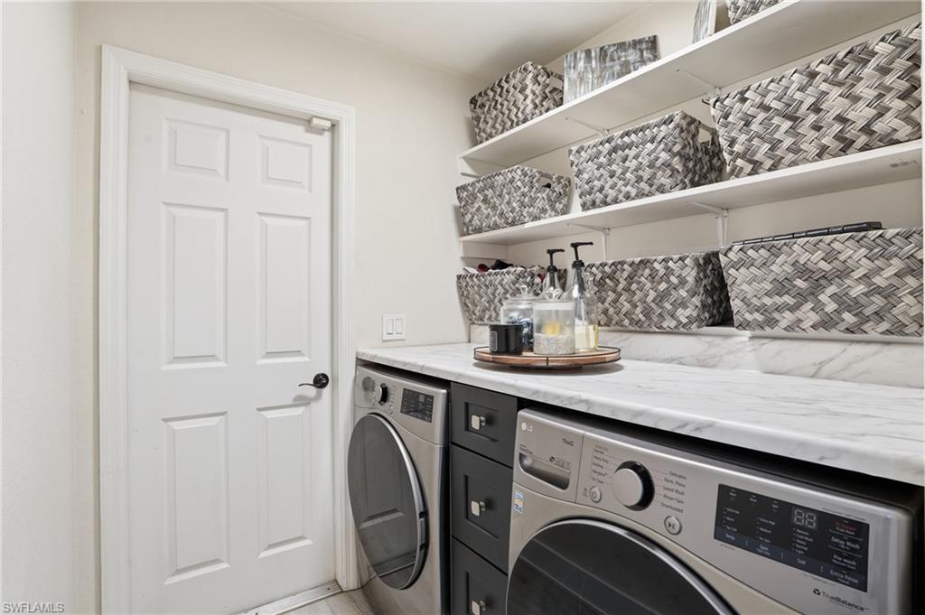 Laundry area featuring washing machine and dryer