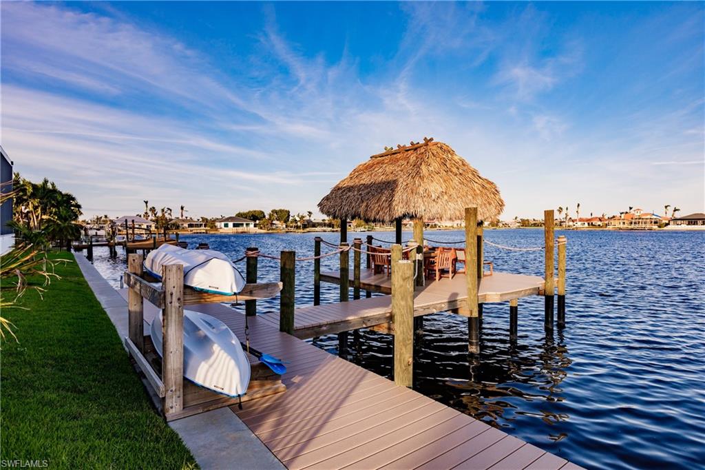 Dock area featuring a water view and a gazebo